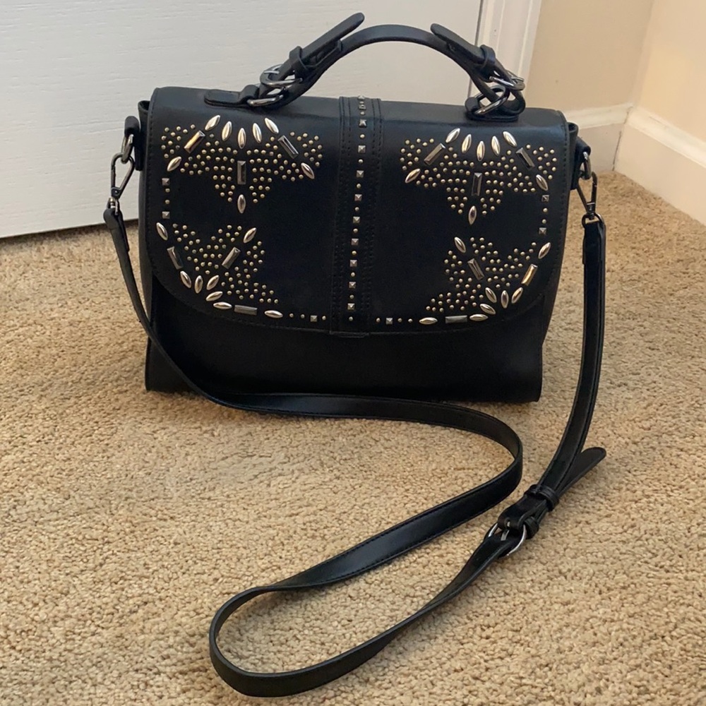 Black studded faux leather handbag